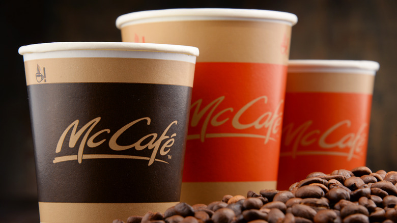 Three of McDonald's McCafe coffee cups