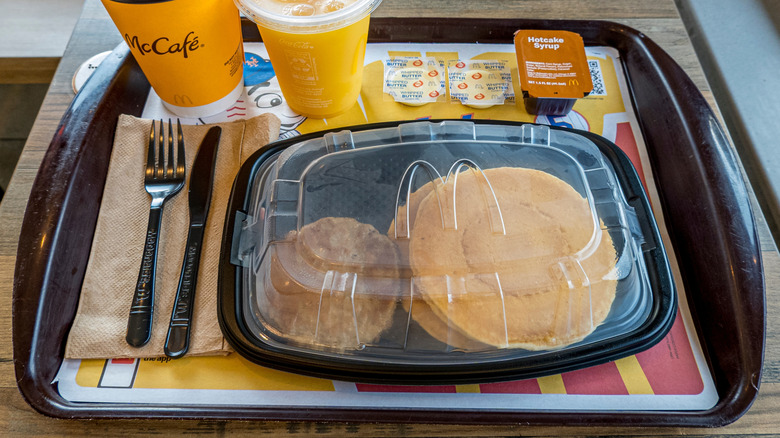 McDonald's hotcakes with sausage on a tray